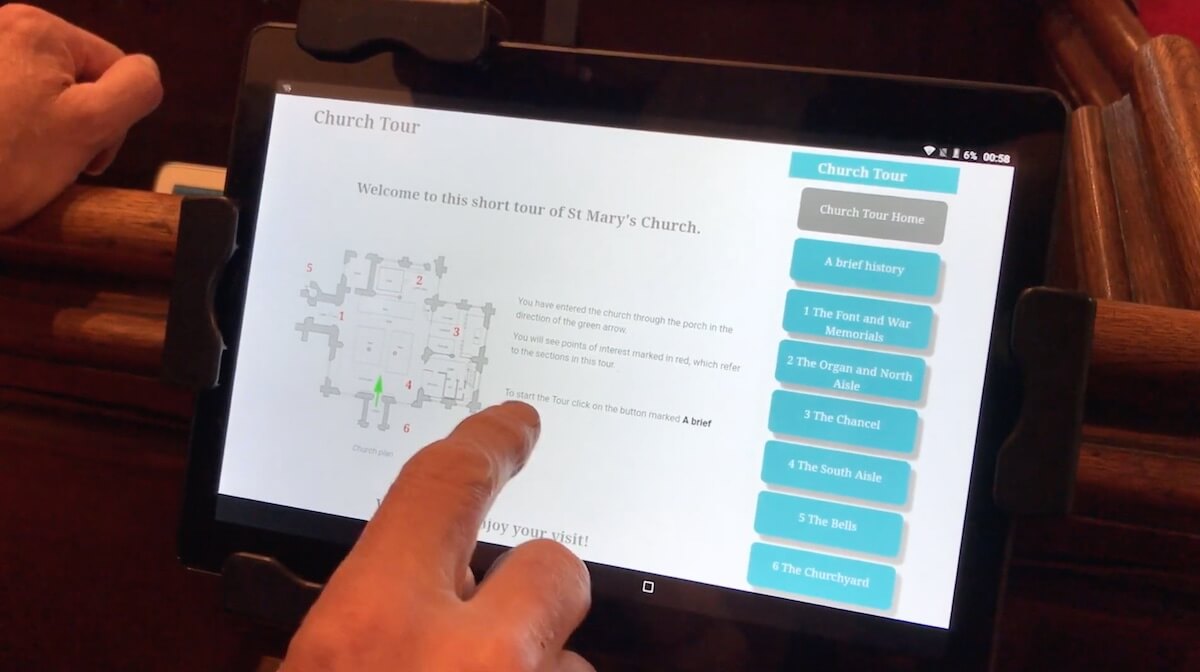 secure tablet on a pew with the info-point church tour