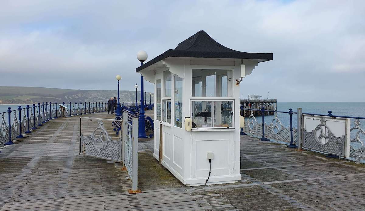 Victorian-style kiosk at the entrance of the pier